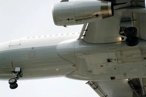 The underside of a modern airplane with its flaps Stock Photos