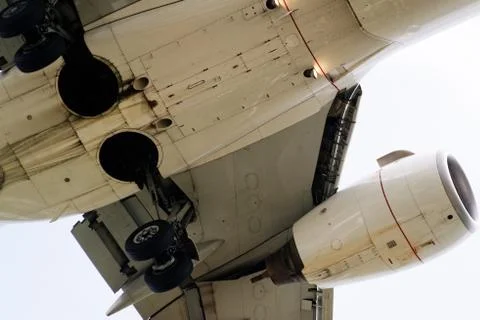 The underside of a modern airplane with its flaps Stock Photos