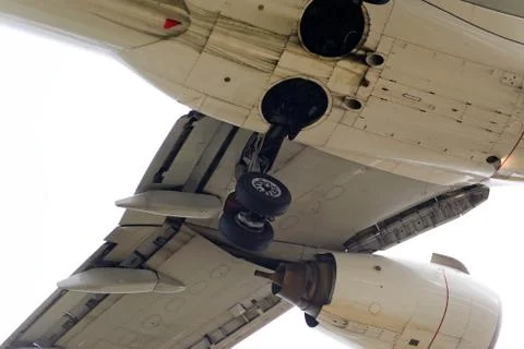 The underside of a modern airplane with its flaps Stock Photos