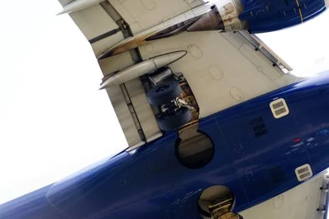 The underside of a modern airplane with its flaps Stock Photos
