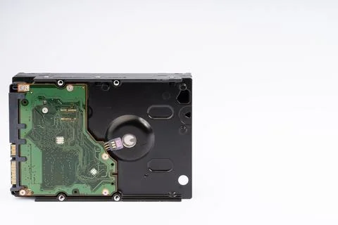 Underside of a Modern Hard Disk Drive with Green Circuit Board Foto stock