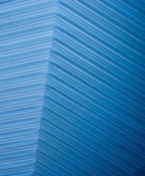 Underside panoramic and perspective view to steel blue glass high rise buildi 스톡 사진