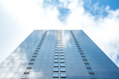 Underside panoramic and perspective view to steel blue glass high rise buildi Stock Photos