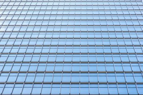 Underside panoramic and perspective view to steel blue glass high rise buildi Stock Photos