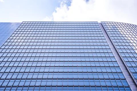 Underside panoramic and perspective view to steel blue glass high rise buildi Stock Photos