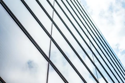Underside panoramic and perspective view to steel blue glass high rise buildi Stock Photos