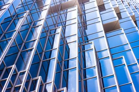 Underside panoramic and perspective view to steel blue glass high rise buildi 스톡 사진