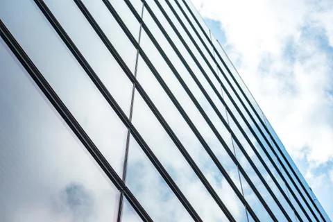 Underside panoramic and perspective view to steel blue glass high rise buildi Stock Photos