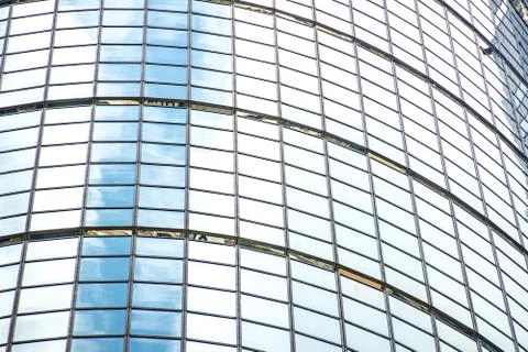 Underside panoramic and perspective view to steel blue glass high rise buildi Stock Photos