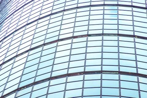 Underside panoramic and perspective view to steel blue glass high rise buildi Stock Photos