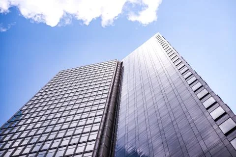 Underside panoramic and perspective view to steel blue glass high rise buildi Stock Photos