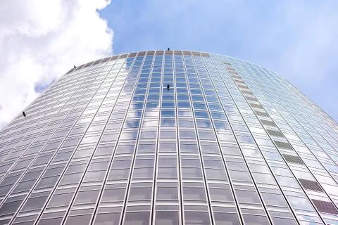 Underside panoramic and perspective view to steel blue glass high rise buildi Stock Photos