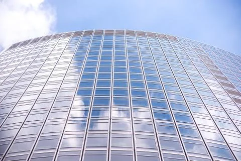 Underside panoramic and perspective view to steel blue glass high rise buildi Stock Photos