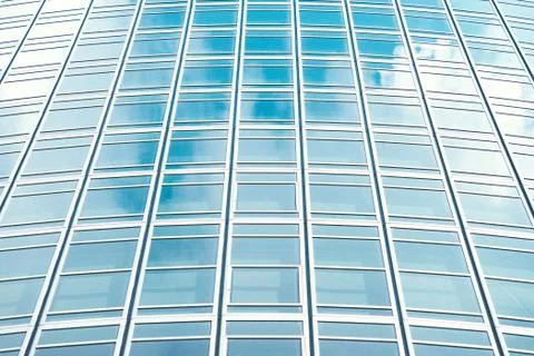 Underside panoramic and perspective view to steel blue glass high rise buildi Stock Photos