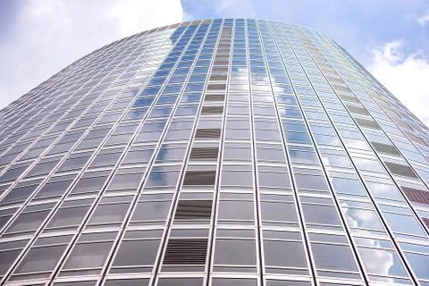 Underside panoramic and perspective view to steel blue glass high rise buildi Stock Photos