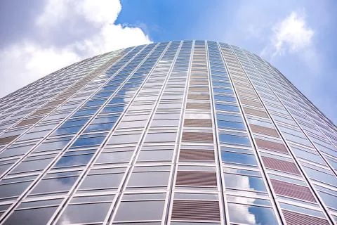 Underside panoramic and perspective view to steel blue glass high rise buildi Stock Photos