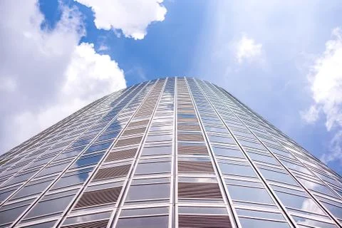 Underside panoramic and perspective view to steel blue glass high rise buildi Stock Photos