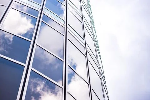 Underside panoramic and perspective view to steel blue glass high rise buildi Stock Photos