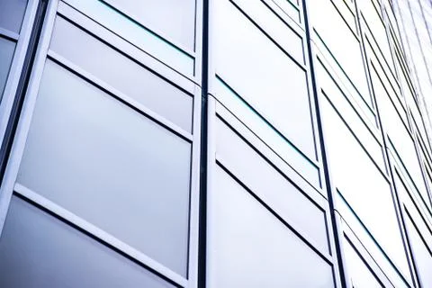 Underside panoramic and perspective view to steel blue glass high rise buildi Stock Photos