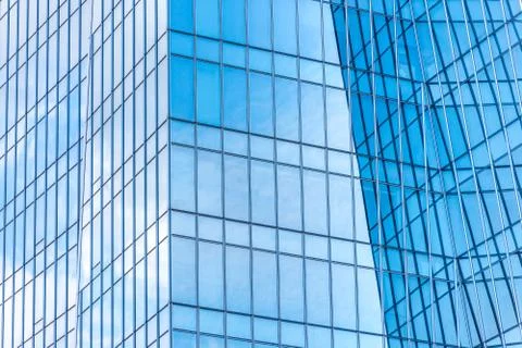 Underside panoramic and perspective view to steel blue glass high rise buildi Stock Photos