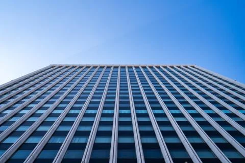 Underside panoramic and perspective view to steel blue glass high rise buildi Stock Photos