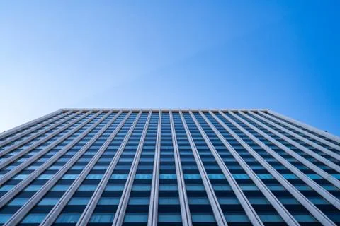 Underside panoramic and perspective view to steel blue glass high rise buildi Stock Photos