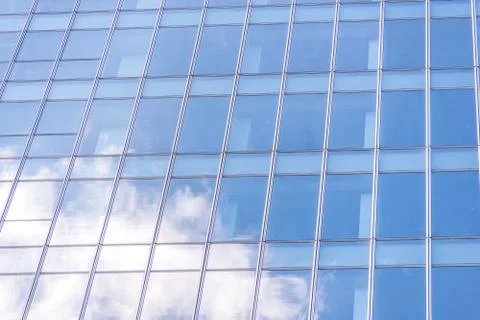 Underside panoramic and perspective view to steel blue glass high rise buildi Stock Photos