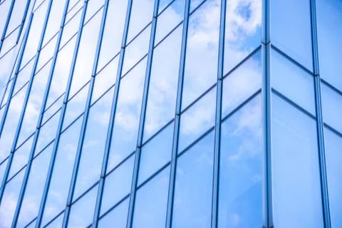 Underside panoramic and perspective view to steel blue glass high rise buildi Stock Photos