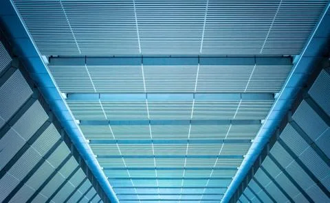 Underside panoramic and perspective view to steel blue glass high rise buildi Stock Photos