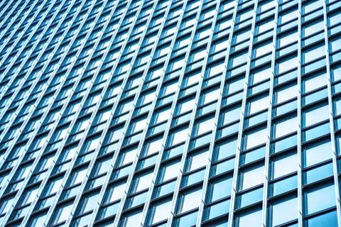 Underside panoramic and perspective view to steel blue glass high rise buildi Stock Photos