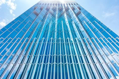 Underside panoramic and perspective view to steel blue glass high rise buildi Stock Photos