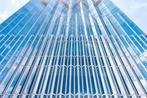 Underside panoramic and perspective view to steel blue glass high rise buildi Stock Photos