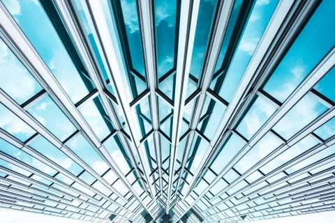 Underside panoramic and perspective view to steel blue glass high rise buildi Stock Photos