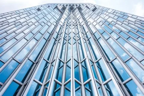 Underside panoramic and perspective view to steel blue glass high rise buildi Stock Photos