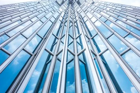 Underside panoramic and perspective view to steel blue glass high rise buildi 스톡 사진