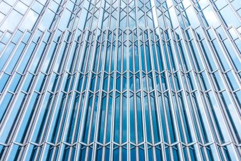 Underside panoramic and perspective view to steel blue glass high rise buildi Stock Photos