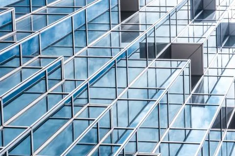 Underside panoramic and perspective view to steel blue glass high rise buildi Stock Photos