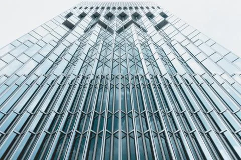 Underside panoramic and perspective view to steel blue glass high rise buildi Stock Photos