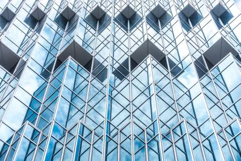 Underside panoramic and perspective view to steel blue glass high rise buildi Stock Photos