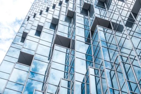Underside panoramic and perspective view to steel blue glass high rise buildi Stock Photos