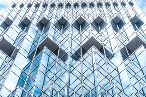 Underside panoramic and perspective view to steel blue glass high rise buildi Stock Photos