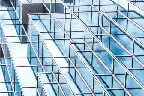 Underside panoramic and perspective view to steel blue glass high rise buildi Stock Photos