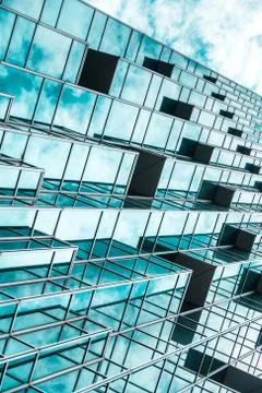 Underside panoramic and perspective view to steel blue glass high rise buildi Stock Photos