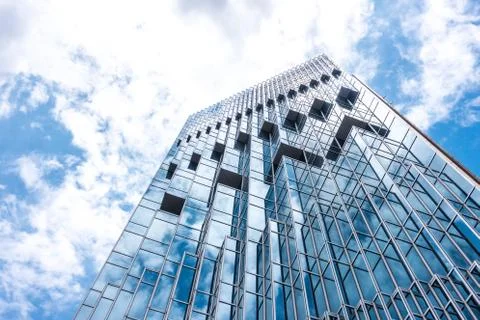 Underside panoramic and perspective view to steel blue glass high rise buildi Stock Photos