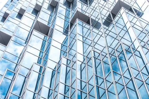 Underside panoramic and perspective view to steel blue glass high rise buildi Stock Photos