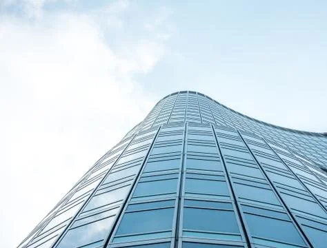 Underside panoramic and perspective view to steel blue glass high rise buildi Stock Photos