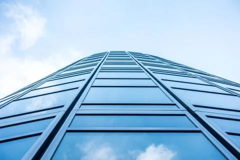 Underside panoramic and perspective view to steel blue glass high rise buildi Stock Photos