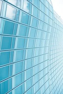 Underside panoramic and perspective view to steel blue glass high rise buildi Stock Photos