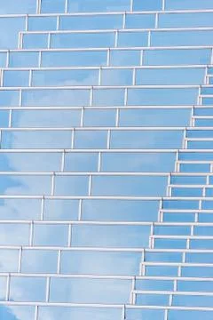 Underside panoramic and perspective view to steel blue glass high rise buildi Stock Photos