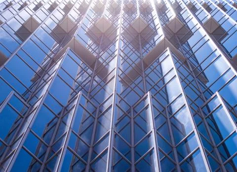 Underside panoramic and perspective view to steel blue glass high rise buildi Stock Photos